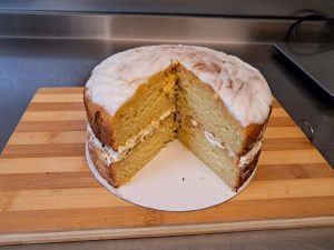 Lemon sponge cake cut open to reveal its layers